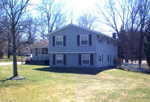 Updated, squeaky clean, spacious 4 bedroom, 3 bath 4 level split on a quiet dead end street in the heart of Howland. Room to roam on this 1/2 acre lot with fenced back yard. Large light living room with vaulted ceilings and beautiful hardwood floors welcome you. Flows into the formal dining room with sliders to composite deck overlooking....Kitchen features plenty of cabinetry, all appliances, moveable island adds to the flexible prep area. Huge family room with cozy fireplace has room for family and friends to gather in a relaxed setting with sliding door to sunroom/ office with exit to backyard. Stunning master suite with sitting room, walk-in closet, and master bath along with a fourth bedroom. Other updates include but not limited too, new roof shingles Nov. 2016, Hot water tank 2016, carpeting 2016, updated breaker box, vinyl siding, replacement windows, high efficiency furnace with electric air cleaner, and more. Nothing left to do except move in.