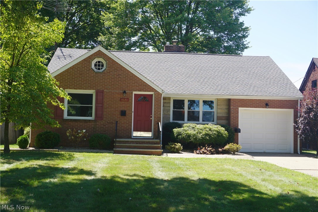 Charming brick and stone bungalow in West Manor! This is a fooler.....much bigger than it appears with over 2100 sq. ft. Beautiful crown molding in living room and dining room. Marble window sills, hardwood floors and wood burning fireplace. Nicely updated first floor full bath. Extremely well maintained and move-in ready. Fully applianced kitchen-stainless steel refrigerator, oven and microwave- with glass tile backsplash. Upstairs has new carpet and is complete with office area, hobby/craft room, bedroom and full bath. Wonderful three season room with sliding glass door leading to large deck.  Step down to the park-like backyard that offers plenty of privacy.  This home offers abundance of storage areas and beautiful knotty pine paneling on second floor.   Many updates include: replaced windows (2010-2012), siding (2017), roof (2019), water softner (2015), furnace (2010), hot water heater (2020), upstairs carpet (2020).