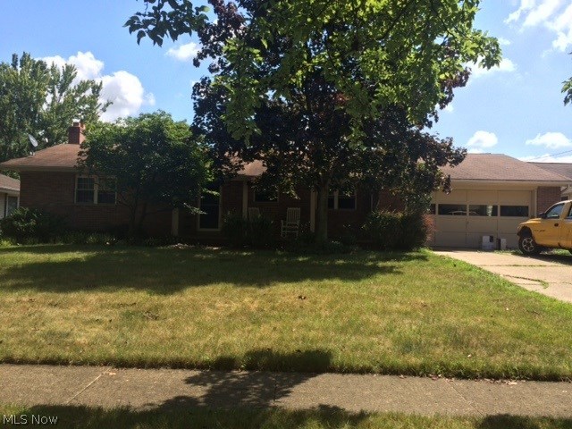 Solid 4 bedroom 2 bath brick home that backs to Meadow Lake. Full walk-out basement, just needs a little TLC.