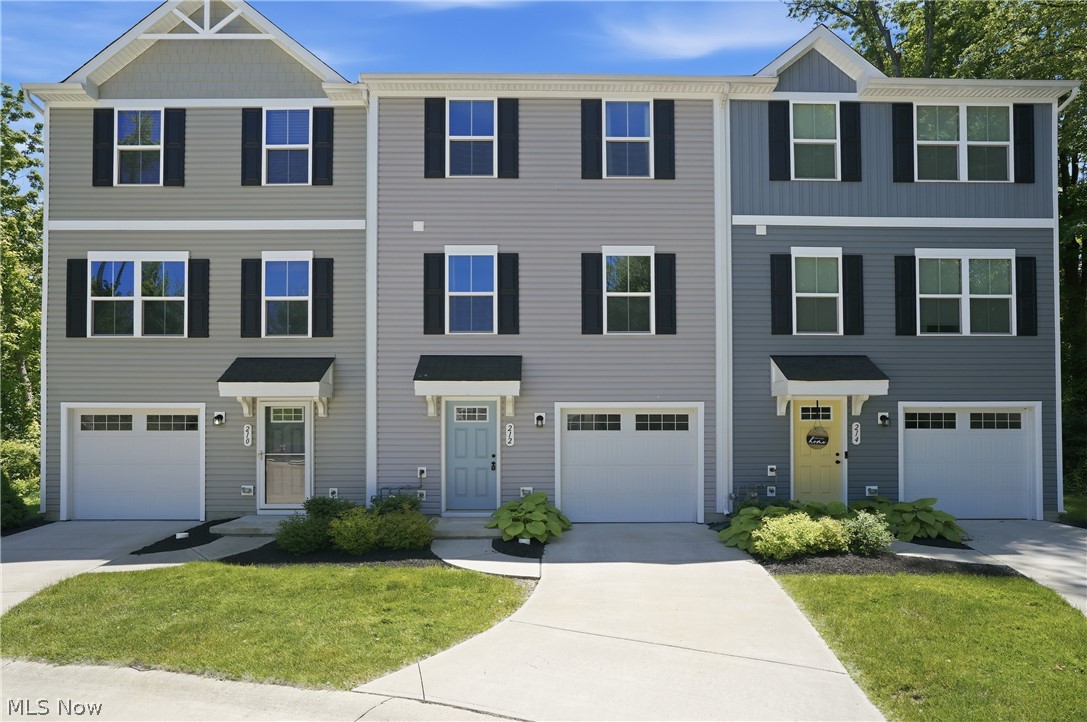 Move-in ready and perfectly located near Lake Erie and the Western Reserve Yacht Club! This beautiful multi-level townhouse offers 3 bedrooms, 2.5 baths, and a thoughtfully designed floor plan filled with natural light. Neutral colors throughout create a bright, inviting atmosphere that complements any décor. The primary suite serves as a private retreat, featuring an en-suite full bath and a generous walk-in closet. Conveniently located on the upper level, the laundry area is situated between the bedrooms, making everyday living a breeze.The main floor open living spaces provide plenty of room to relax or entertain, while the partially finished walk-out lower level offers additional flexible space perfect for a family room, home office, workout area, or hobby room. With abundant natural light, tasteful finishes, and a move-in-ready condition, this 3 year old townhome is a gem. Simply unpack and start enjoying the best of lakeside community living as this area has excellent access to the shores of Lake Erie, scenic beachfronts, and waterfront recreation.