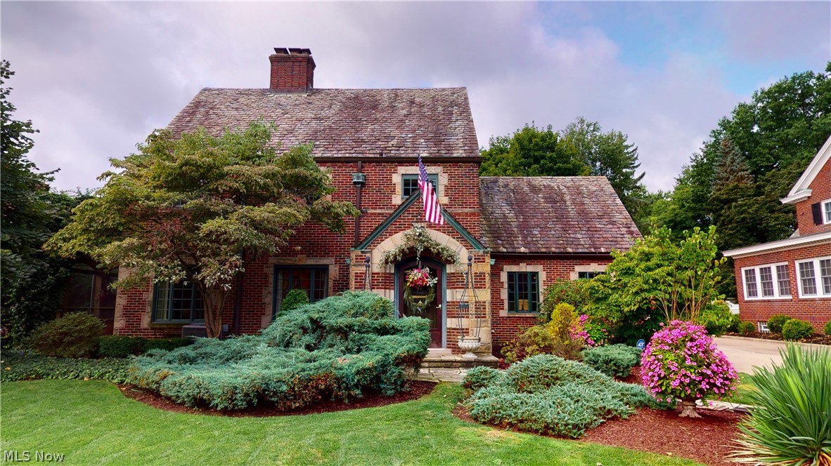 Pride of Ownership! You will enjoy viewing this unique home. This 4 bedroom Tudor home is cozy but also very chic. As you enter the home you will notice the seller attention to detail and great use of space. The living room has a fireplace and is very spacious. The is a garden room off of the living room it is bright and cheery perfect for morning coffee. There is a formal dining room but it is open to the kitchen for entertaining. The kitchen has been updated to a dream kitchen.
It has custom cabinetry and granite counter tops. There are 2 sinks, 2 dishwashers, 2 refrigerator drawers, pull out pantry columns, convection oven, warming drawer, Kitchen aid appliances, and much more.  There is also a family room with a wet bar. Upstairs are 4 bedrooms. The master bedroom and bath have been completely renovated. As you enter the master bedroom with the electric fireplace and ceiling beams you will feel like you are in the South of France. The master bathroom has heated marble floors and a