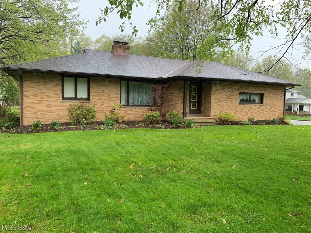 This well maintained brick ranch is nestled on just under one acre. One floor living with plenty of storage space in the full basement and walk up attic. Kitchen features white cabinetry with a brand new laminate flooring. Off the kitchen is the formal dining room space that has double doors to a covered concrete porch on the exterior overlooking a beautiful back yard. Two fulls baths and 3 bedrooms in the one owner property.