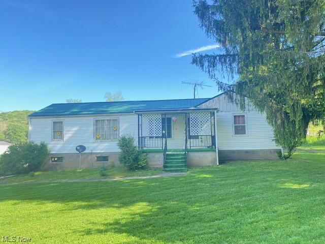 Ranch home with Large open kitchen and dining room. All appliances will stay with the home. There is a fountain wall in kitchen that can easily come down if new buyers wish. Newer metal roof. Nice flat yard. 2 bedrooms and 1 bath. Owner has inherited the home and hasn't lived there in over 40 years. Is selling in as is condition. Buyers will be responsible for any inspections they may want to have including the well and septic. Alot of the personal items will also stay with the home.