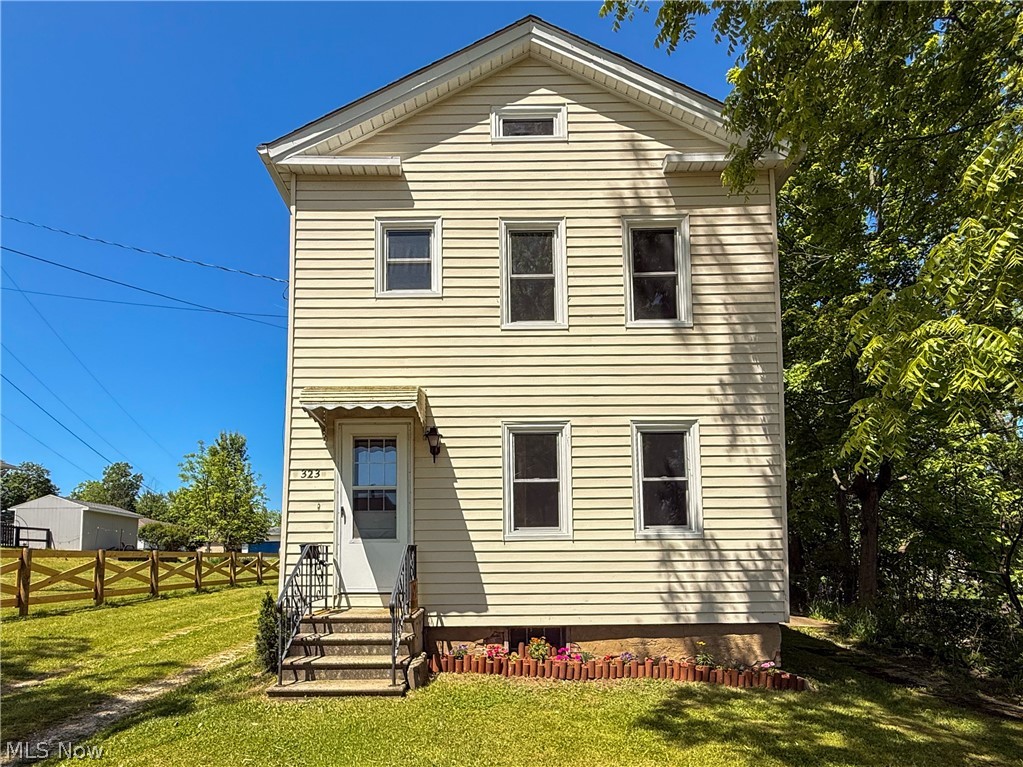 Welcome home to this 3 bedroom, one bathroom Colonial located within walking distance to Medina's Historic Square! Inside you'll find fresh paint, brand new ight fixtures, and windows along with a newly renovated upstairs bathroom. The stainless kitchen sink, refrigerator and stove are also newer, that make the large kitchen stand out! The home offers large, comfortable living areas with natural light throughout! This 20th century home is a must see, so schedule your showing today!
