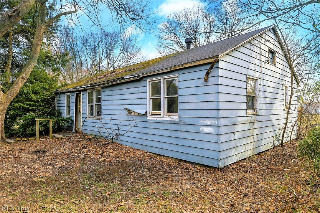*Want To Be NEAR PORTAGE LAKES But Haven't Found What You Have Been Looking For? *BOATING, FISHING, KAYAKING, You Name It ALL Same Street *LONG LAKE Boat Ramp Is Right Here On Cove Blvd *How About A 3 Bedroom RANCH So Close That You Can Walk To The Lake? *How About Almost 3/4 Of An Acre & Beautiful Land That Allows You Room For Summer Cookouts Prior To Or After All Guests Hopping On A Boat Near Your Home & Going For A Ride On The Lake With You? *Everything You Need Is Here! *LOCATION SPECTACULAR! *Beautiful Land **HUGE 3 Car OVERSIZED Garage *Ranch Living *This Is A Diamond In The Rough ~ Investors Or HGTV Enthusiasts ~ Bring Your Vision! *Home & Garage In Need Of Repair, Salvaged And Beauty Brought Back To It. Blank Canvas. *Good Bones *Garage Concrete Floor And Brick Siding Would Make A Great Storage Place For Boats *Nicely Tree Lined On One Side For Privacy *Automated Value Model For Home In Future Great Condition Much Higher *CASH Buyers ONLY *Investors Or Owner Occupied Allowed -