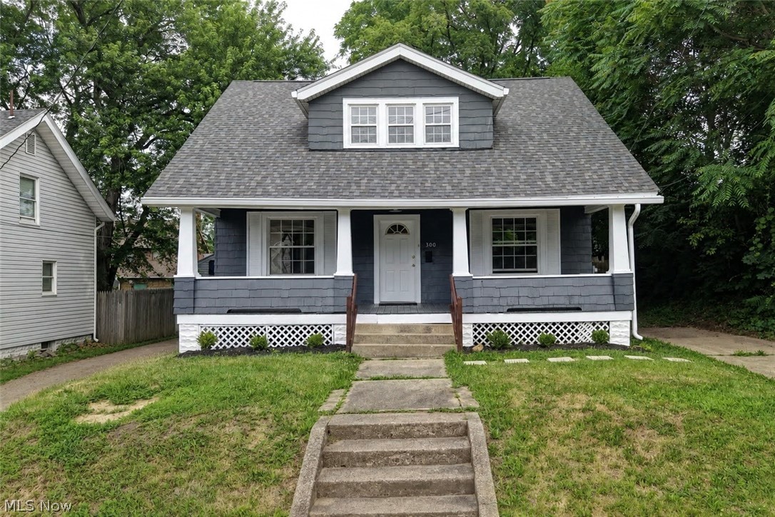 Remodeled 3+ bedroom bungalow nestled on a brick street just outside of downtown Massillon. Remodeled from top to bottom with new flooring, plumbing, roof, cabinetry and countertops, trim, paint, light fixtures and much more. Move in ready and includes a 1/2 bath on the main level, with 3 bedrooms and a full bath on the second level. Includes a detached 1 car garage and a fenced in back yard but the best sitting spot is the covered front porch. Schedule your showing today
