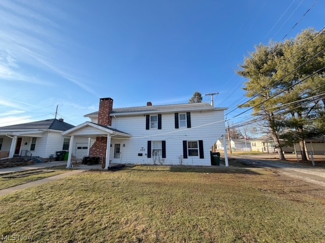 Great location walking distance to Dover City Park! This 2-story home has 4 bedrooms, 1 full bath and a first-floor laundry room with a shower. Inside you will find a warm and welcoming layout featuring a wood-burning fireplace in the eat-in kitchen perfect for gatherings with friends and family. The living room has beautiful built-in bookcases adding charm and practical storage. Upstairs are the 4 bedrooms and the full bath. The master bedroom has a large walk-in closet. Outside there is a covered patio, a 2 car 24x32 detached garage all situated on a level 50x150 city lot. The house has a brand new roof. Immediate possession!