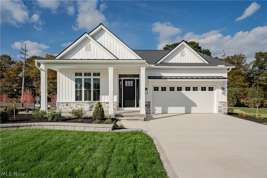 Welcome to the Lily ranch-style floorplan in the upscale Montebello development in Mayfield Village—new construction by Skoda Construction! This thoughtfully designed home showcases a gracious open-concept layout with elevated finishes and attention to detail throughout. Offering approximately 1,860 square feet of living space, this home features 2 bedrooms and 2 full bathrooms. From the welcoming front entry, the foyer opens to a bright and airy main living area designed for both comfort and function. Large windows fill the space with natural light, highlighting an elegant gas fireplace and a well-appointed kitchen featuring a center island, granite countertops, and a full complement of appliances. The primary suite is privately situated off the dining area and offers a spacious bedroom with a vaulted ceiling, a luxurious ensuite full bath, and a walk-in closet. A secondary bedroom and full bath are located near the front of the home, along with a convenient laundry/mudroom. Conveniently located just minutes from schools, shopping, highway access, and North Chagrin Reservation. Images are illustrative purposes only. Property is to be built / new construction.