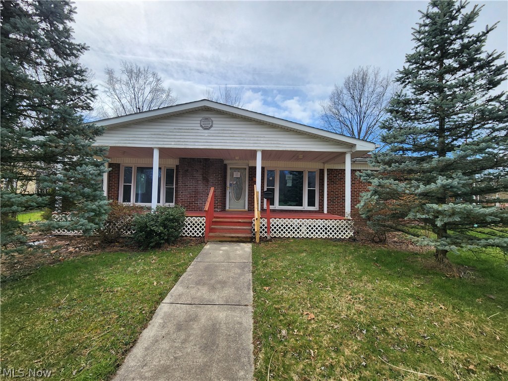 Brick ranch home with 3 bedrooms, 2 bathrooms, living room with fireplace. 2 car detached garage. Property sold as is. No guarantees. No warranties. Must be pre-approved or show proof of funds.