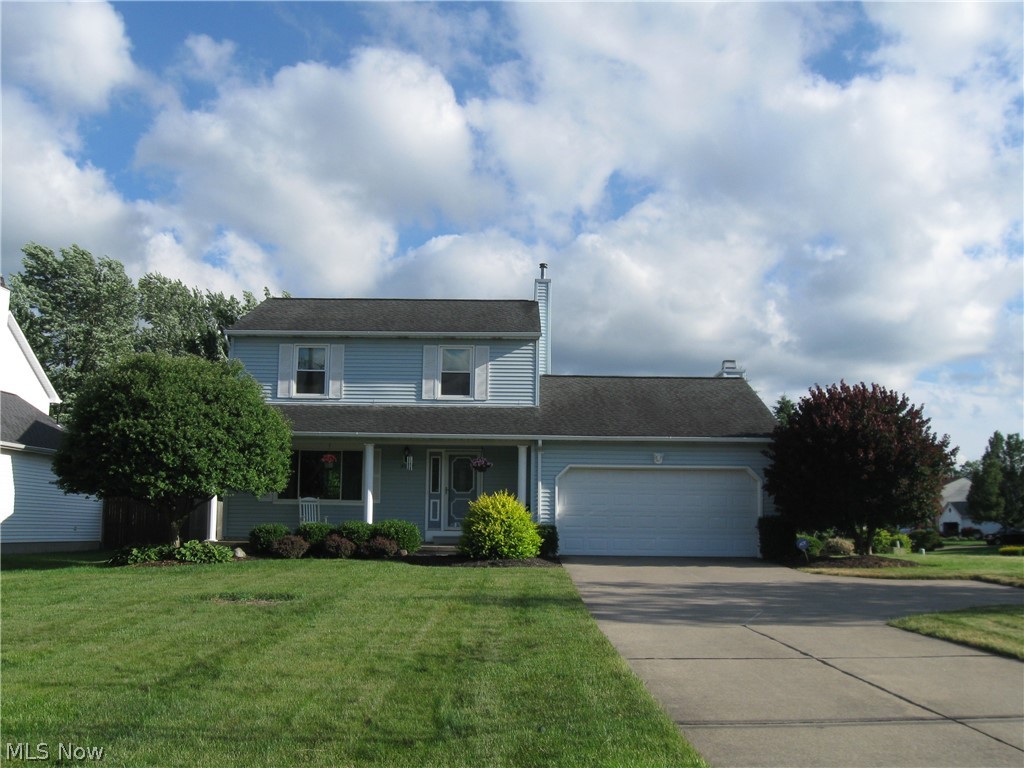 Welcome home to this beautiful 3-bedroom colonial with many recent updates! Modern gray, wide-plank laminate flooring greets you as you hang up your coat in the foyer closet. The living room is bright, wide and is adjacent to the dining room that has a pretty view of the back yard. The eat-­in, 15' x 11' kitchen offers a 2019 dishwasher and newer matching stainless steel range, microwave, & refrigerator, 2019 granite, white cabinets, pantry closet, the same beautiful floor  as the foyer, & subway backsplash. A re-modeled stacked-stone facade on fireplace is the focal point of the comfortable family room. From the family room, access the screened deck where you can enjoy pest-free, summer meals and relaxation time! A convenient half bath is off the front hall and offers a granite vanity top. Upstairs is a spacious master bedroom with double closets & personal access to the hall bath; two additional bedrooms; and a linen closet. More living space abounds in the finished basement with rec