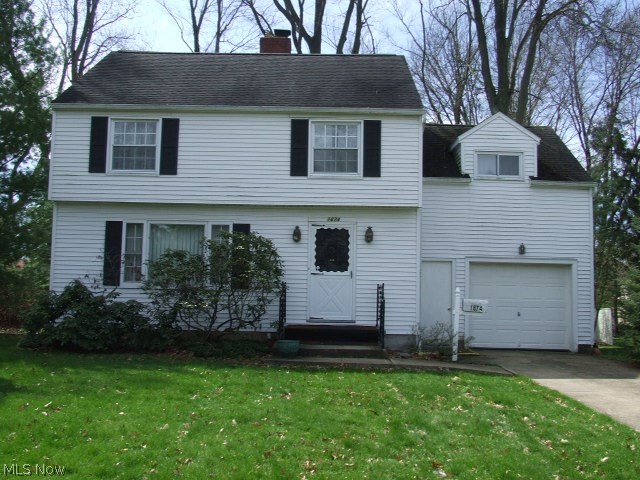 Great 4 bedroom Colonial with fireplaced living room, open to dining room, and sun room that leads to backyard.  Eat-in kitchen with pantry, leads to first floor half bath and attached 1-car garage.  Hardwood floors under carpet.  Furnace, central A/C, and hot water tank all from 2005-2006.  Glass block windows.  Home Warranty.  A little TLC could turn this into your dream home.