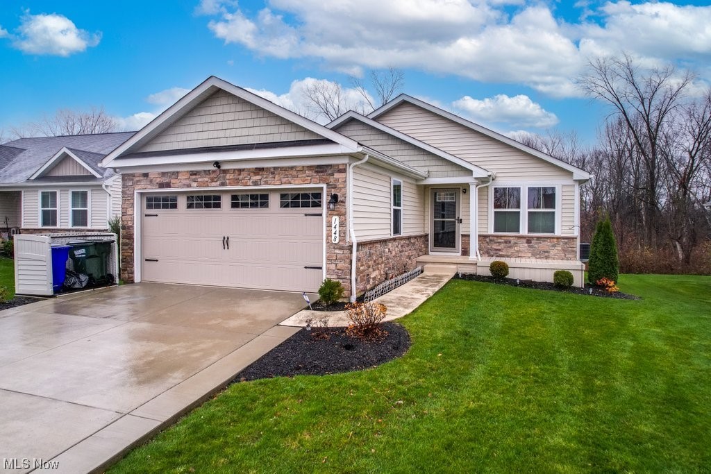 TURN KEY & ready for immediate occupancy! Only 4 Years young, 2BD/2.5BA dream Ranch home in the Villas of Meadow View! Located conveniently between Kent & Streetsboro off of RT43 & minutes from I480 & Ohio Turnpike. As you step inside, you’re greeted by the warmth of the open floor plan w/freshly painted neutral tones (2023) & LVP flooring throughout. The heart of the home is the gourmet kitchen, boasting stainless steel appliances, granite counters, tile back splash, instant hot water, pull-out drawers & island w/seating for entertaining family and friends. Off the kitchen is the family room w/custom insulated blinds & a slider leading to the Endeck deck (2022) w/motorized SunSetter retractable awning overlooking a private wooded area. Bonus room could be used for dining or an office. The primary suite features a large walk-in closet & en-suite bath w/walk-in shower. The 2nd BR has access to a full bathroom, providing comfort & ease for guests. Enjoy the convenience of 1st floor laundry complete w/washer/dryer. The partially finished full basement w/ample storage is perfect for a home gym, rec room area, or a home office. The basement also features a 1/2 bath plumbed for shower. Other features include lawn sprinkler system (2023), alarm system, Nest thermostat, Ring doorbell, 2 car garage, widened driveway (2021), &  floating deck on front porch. Aurora Farms Outlets & Hudson’s First & Main nearby. Be in your new home by the holidays! Schedule a private showing today!