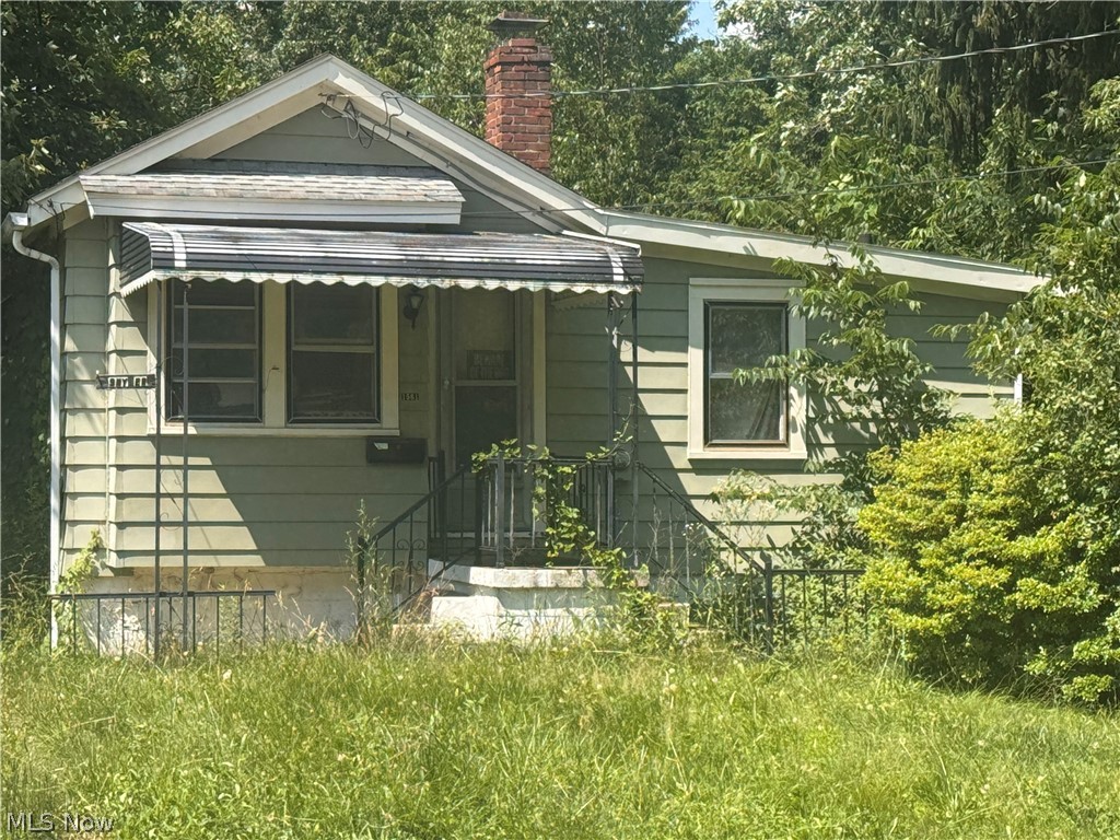 Nestled on a quiet street on the edge of Akron and Tallmadge, this property offers a peaceful setting while remaining highly accessible to nearby shopping and dining. This home presents an excellent opportunity for an investment property, a project home, a first-time buyer option, or anyone looking to downsize. The exterior features a sizeable, fully fenced yard equipped with two storage sheds. Bring your vision to finish this space and maximize its true potential!