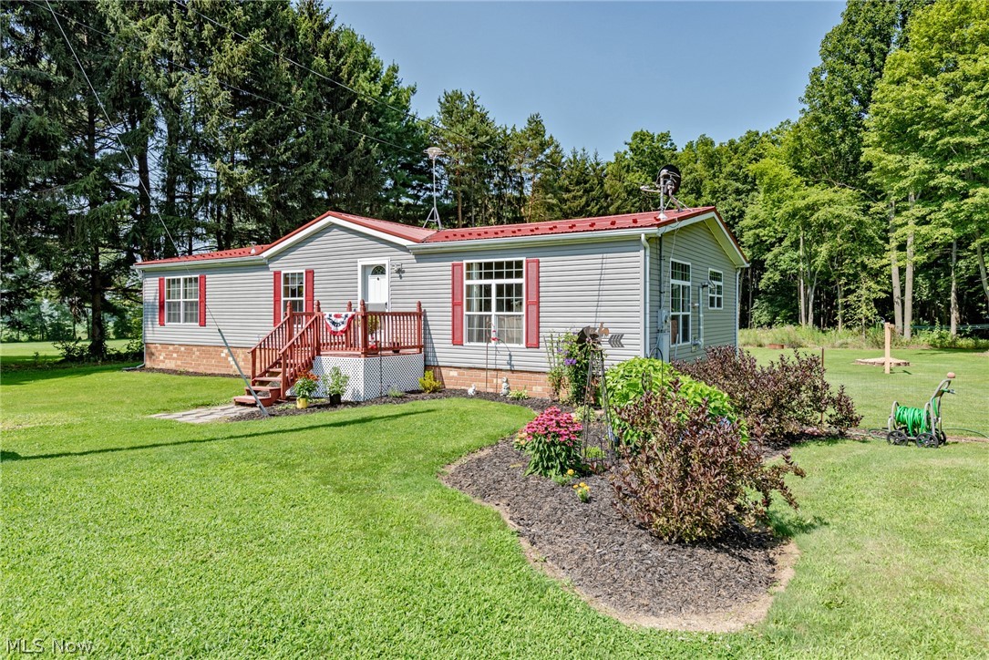 Nice! Move right in to this well-kept ranch style home on 3 acres! This home provides over 1,500 square feet of living space with an open floorplan and a master bedroom suite! The front porch opens into the spacious and open living room, which features a vaulted ceiling, a pellet stove, and plenty of windows for natural light. The kitchen includes a full complement of stainless steel appliances, an island, and a sunny eat-in area. Down the hall, you will find three bedrooms and two full bathrooms, including the master suite. The master suite includes a bedroom with a vaulted ceiling, a walk-in closet, and a luxurious en-suite bath with a step-in shower, a soaking tub, and two sinks. A laundry / utility room with a 2019 heat pump, a 2020 water heater, and a newer washer and dryer completes the interior of this home. Outside, you will find a large fenced in area with two storage sheds, plus there is a nice garden plot and plenty of space for outdoor activities on 3 acres. Located just no
