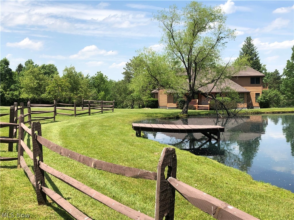 Stunning Architect Designed Custom Built 5 Bedrm Home situated on just under 10 breathtaking acres in Montville Township. A RARE OPPORTUNITY for a PRIVATE ESTATE close to Medina with great I-71/271/18 access w/PUBLIC WATER and NO CITY TAX!   Two owners since new and meticulously maintained.  This Custom Home offers * Great Room w/Cathedral Ceiling*Custom solid wood cherry cabinets throughout *2 Story Foyer flanked by the clean lines of an open staircase *Living Rm/Morning Rm *Formal Dining Rm *Large Custom Eat-In Kitchen opens to the Great Rm *Butler's Pantry/Mudrm *Huge Private Primary Suite with adjoining Sun Rm, Bath with Garden Soaking Tub and Separate Shower and a Huge Walk-in Closet with Built IN *The 1st FLR is completed by an additional Bedroom and Guest Ba *Upstairs 3 additional Spacious Bedrms with Large Full Ba *Quality 2 x 6 Construction *Natural Gas Heat *Huge 2,260 sq. ft unfinished Basement fully plumbed, for work space, storage or finish for potential 5,557 sq. ft Living Space *Freshly Stained House/Barn *Roof ('17) *HWT ('17) *AC ('22) *Newer Garage Door/Andersen Exterior Doors *Washer/Dryer ('24) *Cooktop ('25) *Newer Furnace/High-end Stainless Steel Appliances *Beautiful Stocked Pond *40 x 42 Barn ('15) - w/Concrete Floor & Full Electric *Orchard *Split Rail Fencing *Full Property Access via Walking Trail.