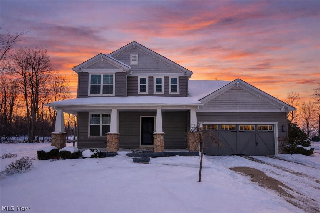 This is the home where everyday moments turn into lasting memories. Nestled in the heart of the highly sought-after Fieldstone Preserve, this beautifully maintained 4 bedroom, 2.5 bath Colonial blends elegance, comfort, and family-focused living. Enjoy slow mornings and cozy evenings on the largest covered front porch in the community, a welcoming space to gather in every season. Inside, sunlight fills the freshly painted open-concept kitchen and living room, enhanced by a 4-ft extension and sunroom that create an airy, inviting space ideal for entertaining. The kitchen is the heart of the home, featuring a large center island, SS appliances, and a spacious walk-in pantry. Just off the kitchen, a planning center with built-in desk works perfectly as a coffee bar, homework hub, or mail drop zone. A first-floor flex room adapts effortlessly as a home office, playroom, or creative space, while the mudroom off the garage adds everyday convenience. Peace of mind comes with an ADT security system, and the WiFi-controlled HVAC allows comfort and efficiency at your fingertips. Upstairs, a versatile loft offers a cozy retreat for homework, movie nights, or quiet relaxation, while the conveniently located upstairs laundry makes routines a breeze. The luxurious primary suite is a true escape with a tray ceiling and spa-like extended walk-in shower, while three additional bedrooms offer walk-in closets and plenty of space to grow. A partially finished basement, currently a fully functioning hair salon with plumbing, adds flexibility and storage. Outside, unwind in the fully fenced backyard with a concrete patio, pergola, outdoor dining and fire pit area, and in-ground sprinkler system, all backing to green space for rare privacy. A 2-car tandem garage provides room for up to three vehicles. Located in a walkable neighborhood near a playground and Kinsner Elementary, and just minutes from shopping, this is more than a house. It is the lifestyle you’ve been waiting for.