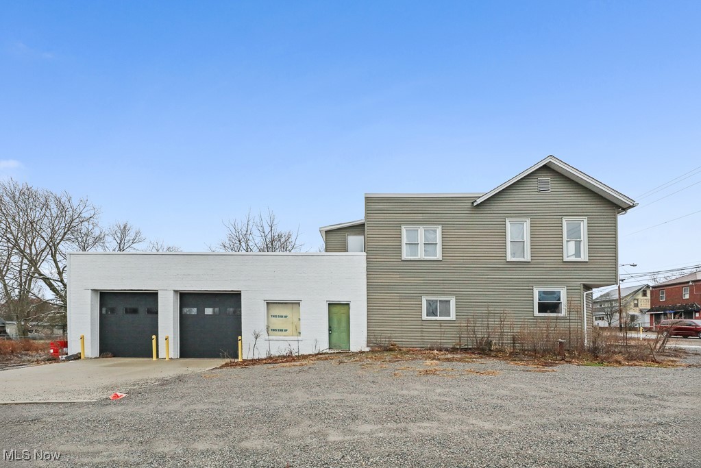 Endless possibilities await with this unique property. Part of the building is already configured for a duplex or triplex layout. This section will need a full renovation, many of the mechanicals have already been updated—giving you a strong head start.
An attached two-car garage/workshop adds even more versatility. Currently used as warehouse space, it could easily be adapted for car detailing, retail, storage, rental garages, or a variety of other uses.
With extremely high visibility and a strong traffic count on two main highways, this location offers exceptional exposure for any business or investment vision. Immediate occupancy available.
Call for details—this property truly offers unlimited potential