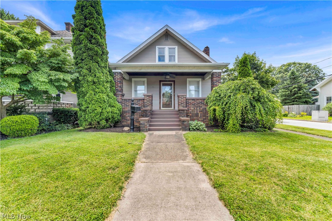 Fan of roller coaster thrills or waterpark excitement? This charming two story home offers 4 bedrooms, 1.5 bathrooms, and 1,680 square feet of living space in the heart of Sandusky. This home blends classic character with functional living and features a full basement, a cozy fireplace, and spacious living areas. The property also includes a detached 2 car garage, offering ample storage and parking, along with a spacious backyard. Conveniently located near downtown Sandusky, schools, shopping, and restaurants. This property offers an excellent opportunity as a primary residence or investment. Schedule your showing today!