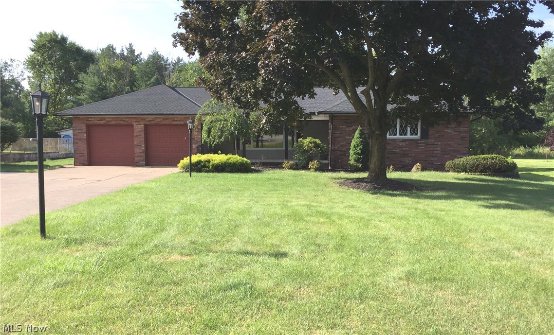Fantastic all brick Ranch in highly desirable North Royalton School District.  Perfect for the first-time home buyers or those wanting to downsize.  Spend the winters enjoying the view from your cozy great room while basking in the glow of the stone fireplace.  Home has been lovingly maintained.  Newer roof and central air.  Move-in ready completely from top to bottom. All new flooring recently installed.
