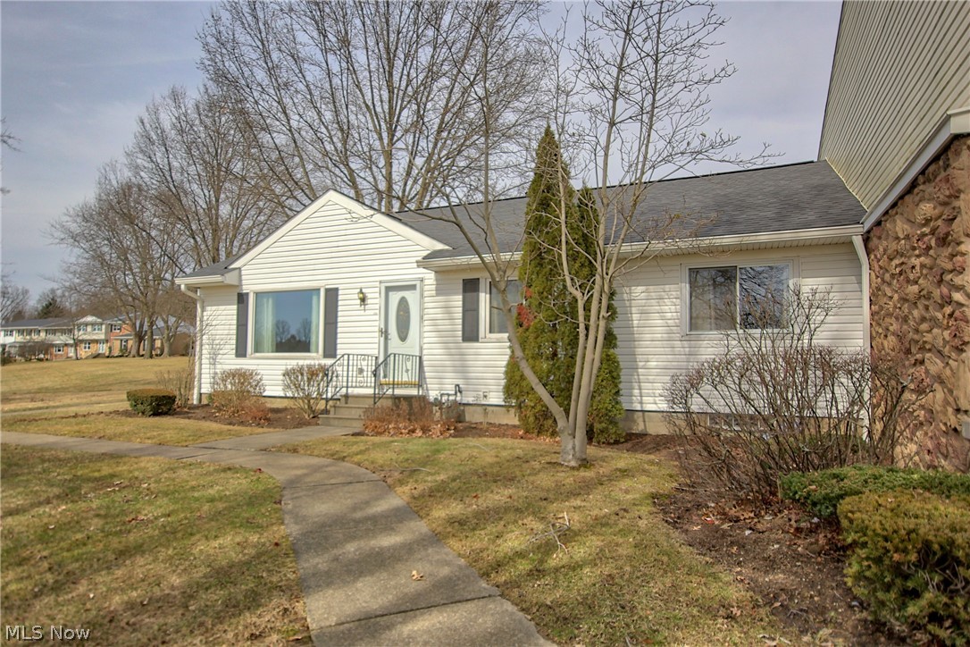 Brand new to market, this desirable end unit ranch is very spacious and ready to move in! The views are spectacular and large windows let tons of natural light come in.  Large kitchen area with new high quality wood laminate flooring, loads of cabinetry and includes all appliances.  Family room off of kitchen includes newer carpet and neutral paint.  The first bedroom is huge with 2 double closets and newer carpet. Was originally a 3 bedroom and converted to a 2 bedroom.  Could be changed back to a 3 bedroom.  The master at the end of the hall includes a private master bath and newer carpet.  The lower level walk out has high ceilings, is partially finished and includes your half bath.  Two car garage and a privacy fence around your entire large patio area.  Community has club house and pool to enjoy all summer long!