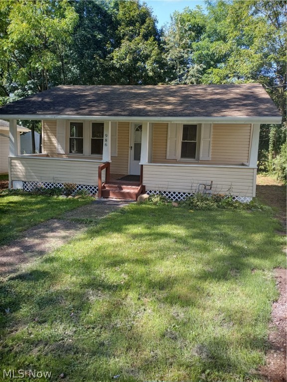 Move right in to this updated ranch in Springfield  New within last year, all new eat-in kitchen including brand new oven/range and refrigerator, all new bath, new carpeting and flooring throughout, all new interior drywall, new insulation throughout, new laundry tub and glass block windows in basement, new exterior doors and screens, all new plumbing, new electric panel box and wiring, new well pressure tank and water softener, new front porch and back deck and new gutters and downspouts.  The septic system was installed in September, 2021 and approved by the Summit County Health Department.  Other updates include: well, 2,000, windows, 2005, roof, 2006 and hot water tank, 2017.  Two driveways for extra parking with brand new gravel.  Back yard grass seed sown after new septic was installed.  The seller is offering an America's Preferred home warranty for the buyer.  Perfect first home or last home for those wanting to downsize.  Please schedule an appointment to see this updated home