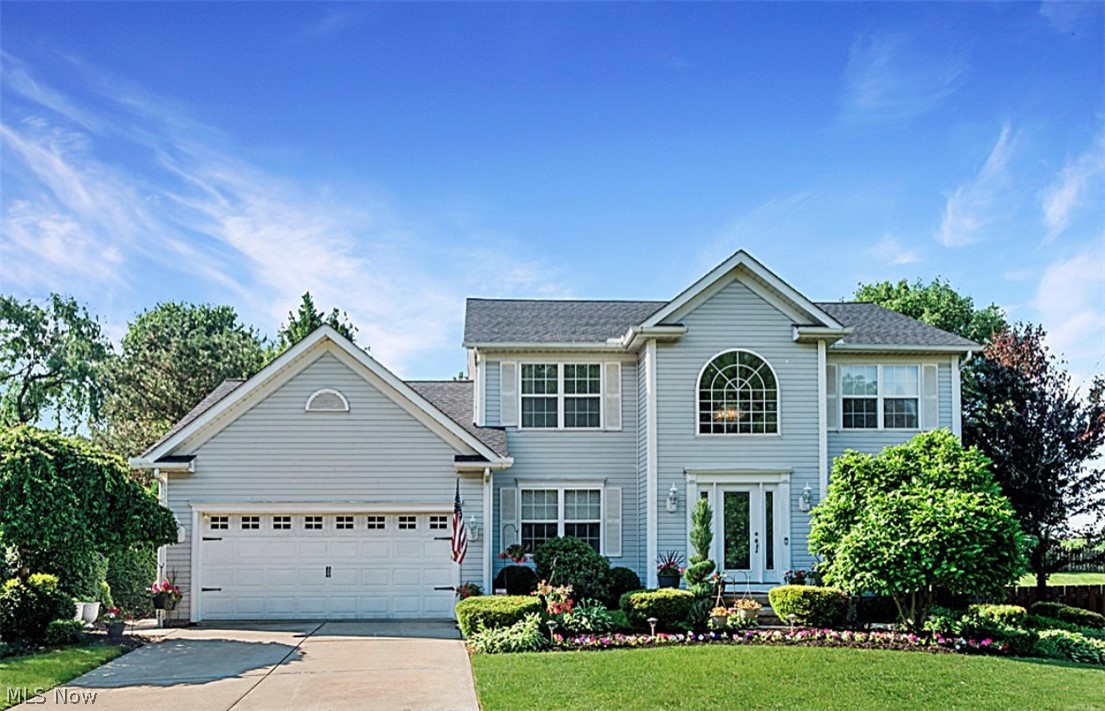 Welcome Home to an amazingly maintained and spacious 4 Bedroom Colonial located in the heart of Mentor! Located on a cul-de-sac, enjoy the safety and serenity of a beautiful community without the hassles of an HOA! The second level master bedroom and bath, are accompanied by two additional bedrooms upstairs, and another full bath. The main floor features the fourth bedroom, along with a convenient half bath. The kitchen was designed to impress, and allow for functionality, with an oversized island with barstool seating, designer cabinets, newer and beautiful appliances. Semi open floor plan allows for convenience, function and style, as the Family and Living room areas are uniquely designed, allowing for maximum natural lighting. Enjoy the options of a brunch around the eat-in kitchen setting, or an amazing dinner in the formal dining room, this house is an elite level for both relaxation and entertainment. The finished basement with wet bar, not only creates additional entertainment s