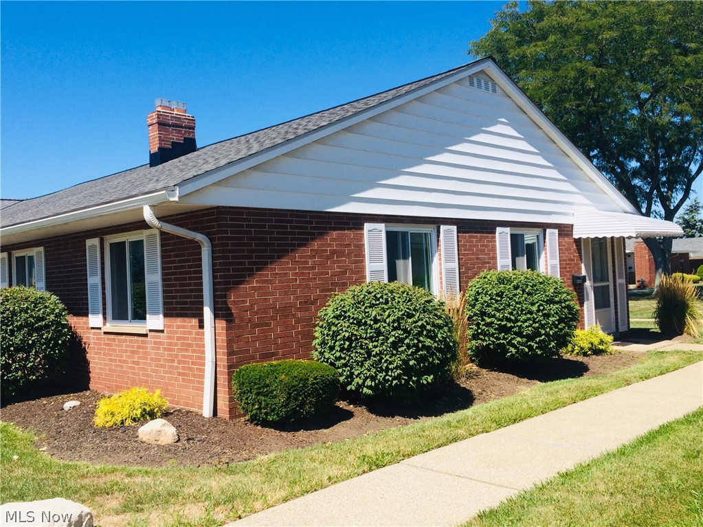 Easy living in this 2 bedroom ranch condo.  End unit with easy access to shopping and restaurants. Laundry hook up available in unit, but also has laundry facility on site! 1 designated covered parking spot, large attic for storage too!  Beautiful courtyard, well maintained, roof 2018. Stop paying rent! Make your appointment and start living.
