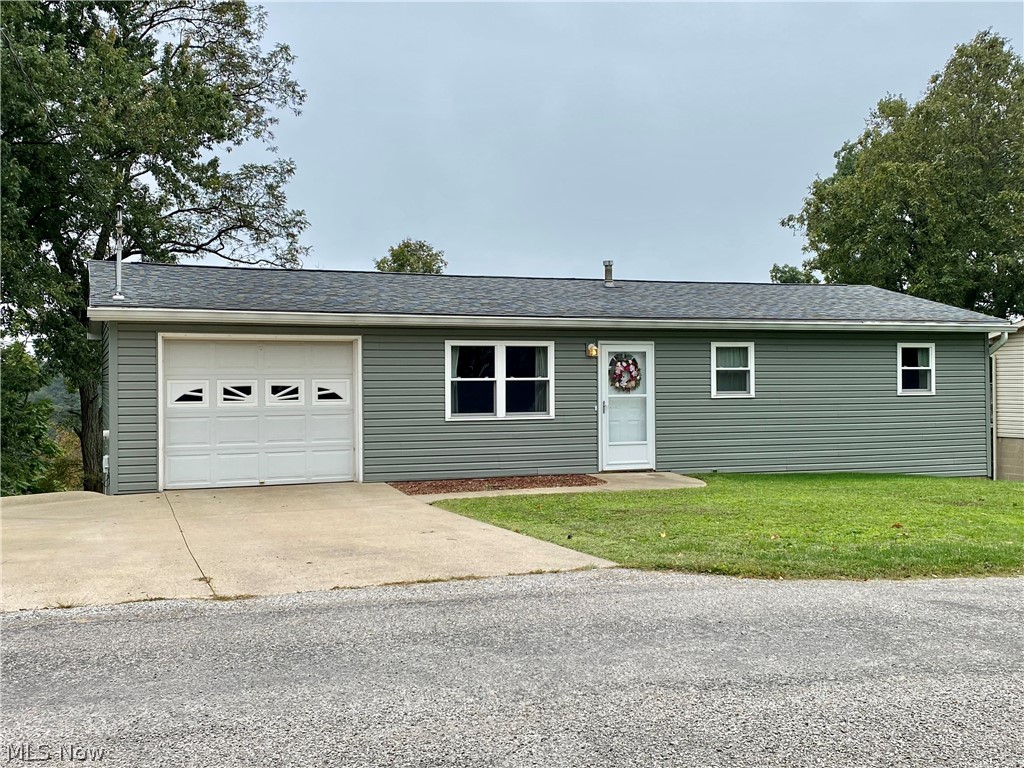 OMGosh! This is such an adorable home! Located in the Warren School district and at the end of a cul-de-sac, this home has many updates including new vinyl siding, roof, kitchen oak cabinets, recently painted deck, windows and so much more! You could even move the washer and dryer upstairs into a bedroom and you'd have all one floor living! The wooded view from the back deck is amazing! Don't let this cutie pass you by!