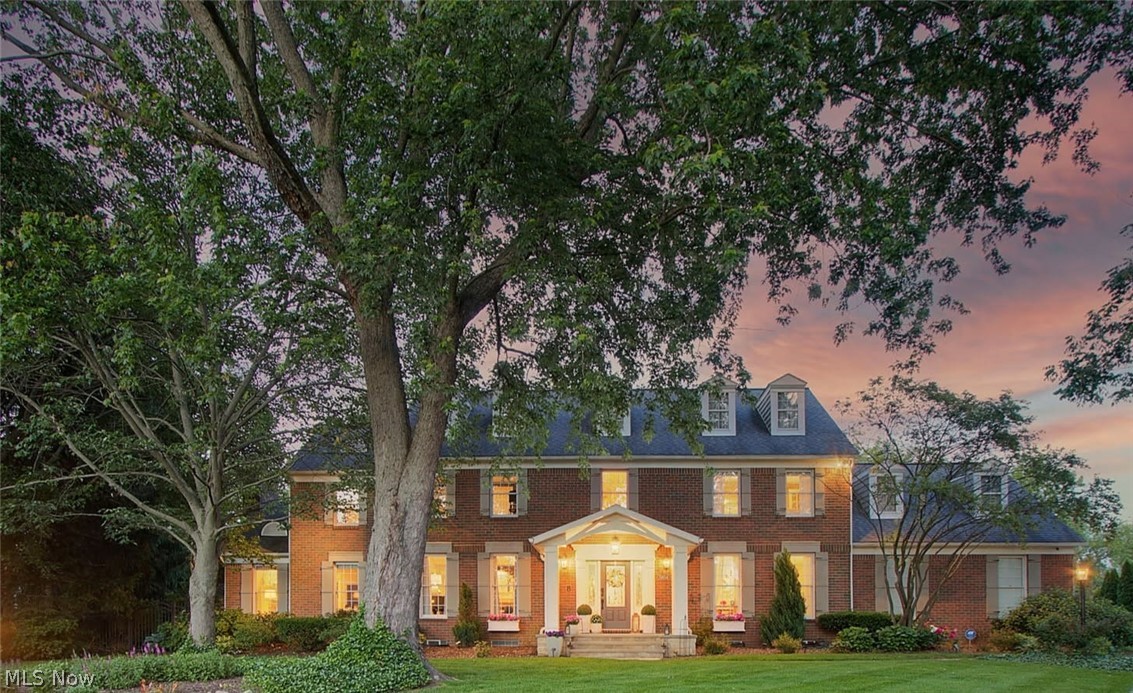 This stately luxury residence is tucked away on a quiet cul-de-sac surrounded by mature trees and  professional landscaping, exceptional privacy and timeless curb appeal. Thoughtfully updated throughout, the home blends high-end finishes with warm, inviting living spaces designed for both everyday comfort and entertaining.

Inside, rich hardwood floors and custom woodwork throughout leading to a beautifully renovated kitchen with a premium ZLINE range, farmhouse sink and sophisticated custom finishes.
Multiple fireplaces through out the home create an atmosphere of elegance .A dedicated office with  backyard views provides the perfect private workspace .
The stunning four-season sunroom with heated floors offers year-round enjoyment and panoramic views of the private outdoor setting.

The luxurious primary suite is a true sanctuary with a spa-inspired bath with elevated finishes. The sitting room with its own fireplace is the perfect escape at the end of the day.

The beautifully designed patio, pergola and fire feature overlooks a peaceful pond providing complete privacy.

This remarkable home offers the perfect blend of luxury, beauty, and everyday livability.
A short drive down the street from Gervasi Vineyard Resort and Spa & convenient access to Middlebranch trail
Truly one of a kind!