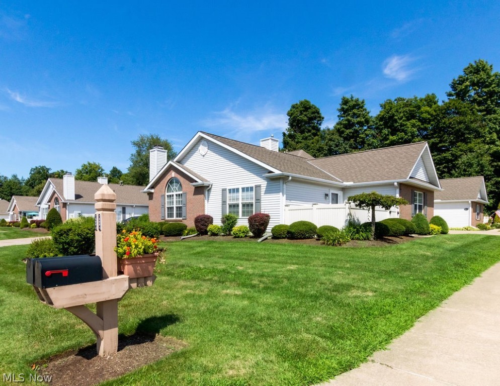 Looking for a ranch condo with an open floor plan,see this VIOLATION FREE vinyl/brick sided 3-bedroom/2 full bathroom condo;the spacious great room with vaulted ceilings,palladium window with pull down shades,gas fireplace with remote and ceiling fan with remote; formal dining room; linen closet;kitchen has a breakfast bar,refrigerator,gas stove,built-in microwave,built-in dishwasher, and an abundance of cupboards/counter space;large laundry room(7x11) has hook-up for an electric dryer,many wall cabinets;all carpeting throughout the condo have been steamed vacuumed twice;main bedroom has a full bathroom with a shower,two double closets,ceiling fan and horizontal blinds;the other two bedrooms are nicely sized with large closets,ceiling fans,and horizontal window blinds;foyer(5x16) has a guest closet,and the bedroom located off of the foyer could be used as an office,den or 3rd bedroom because it has a walk-in closet;patio area(10x18) has a concrete patio(8x16) and the patio area is fenc