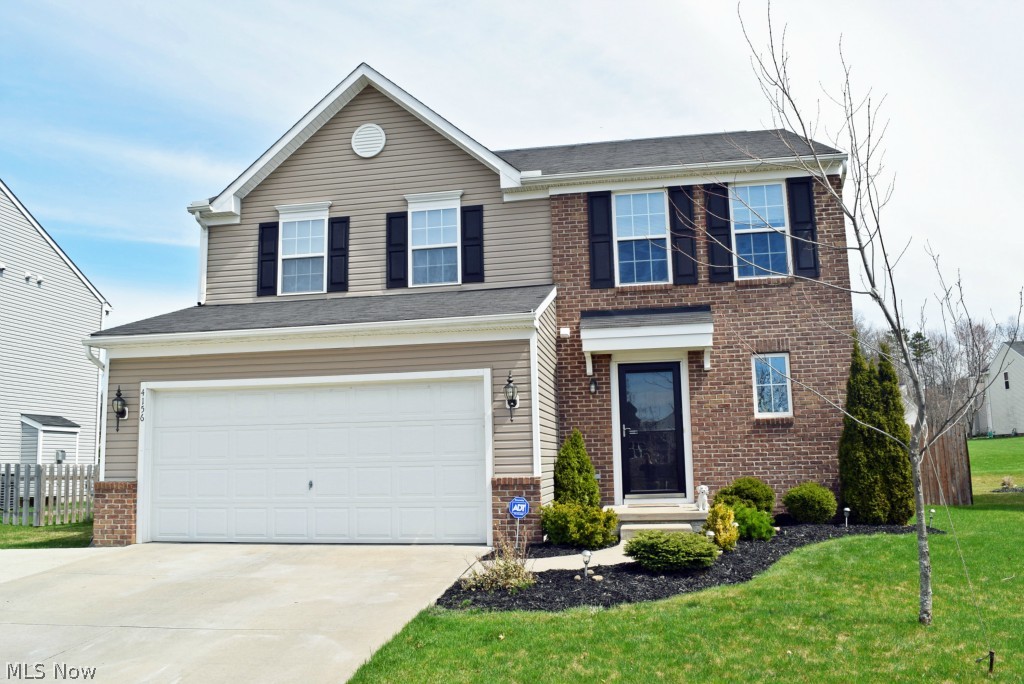 Welcome to your new home! Fabulous brick front-elevation with extra wide driveway for extra parking. Open floor plan for comfortable living! First floor includes foyer, half bath, mudroom, living room, dining room and kitchen. Kitchen includes stationary island and large corner pantry. Dining room opens to the spacious deck through patio slider, backyard is completely fenced with a wooden privacy fence. Second floor includes large master suite with private bathroom and large walk-in closet, two additional bedrooms, additional full bathroom & a spacious laundry room. The basement is beautifully finished and adds approx. 400SF of finished living space and tons of storage. High-efficient gas furnace to keep utility costs low! This home is a must see to appreciate! With the all upgrades from the brick front, extra parking, finished garage, the fenced backyard, deck and finished basement, this one has everything on your list!  Call today to schedule your personal showing!