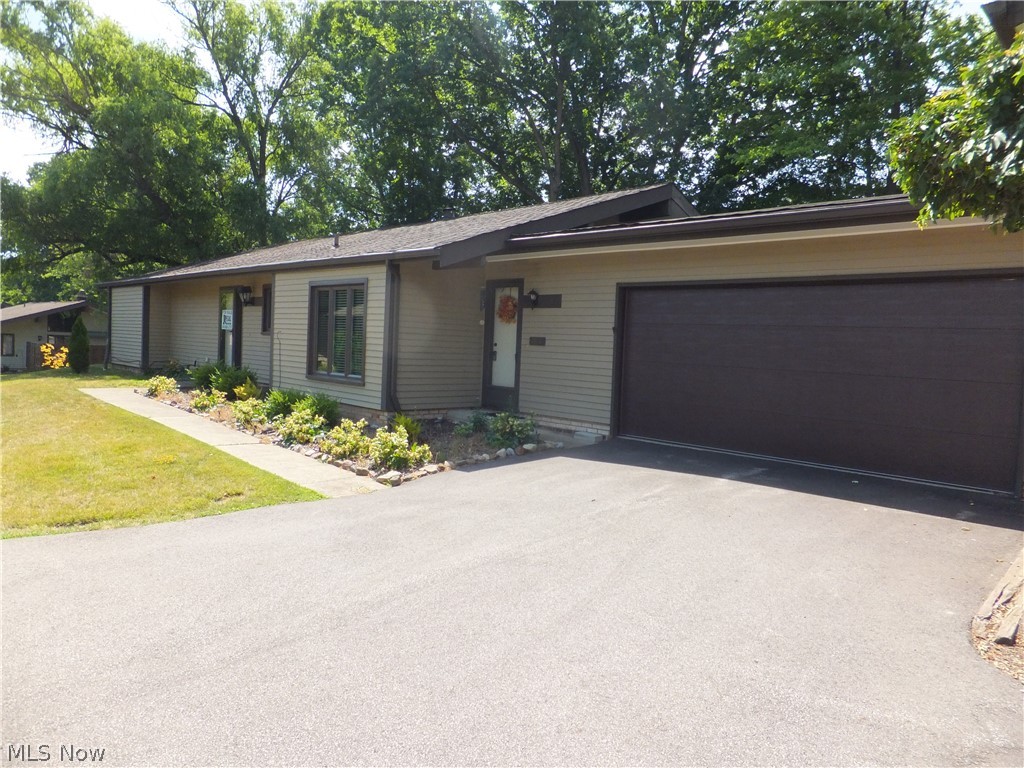 Enjoy this spacious one floor 2-bedroom condo located in the heart of downtown Brecksville and within walking distance of the Brecksville Reservation, library, rec center, restaurants, shopping, minutes to freeway, open floor plan with vaulted ceilings, fireplace, central air, all appliances stay, large walk-in closet, attached 2 1/2 car garage w/nature stone floor, water, electric and door opener