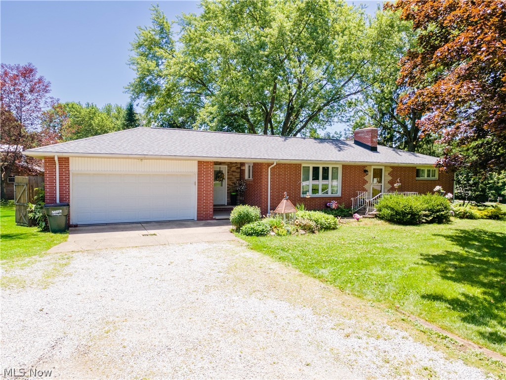 Welcome to 5069 Back Orrville Rd, Wooster, OH 44691—a well-maintained 3-bedroom, 2-bathroom brick home on 0.617 acres offering comfortable living space, practical updates, and a functional layout both inside and out.

Step through the front door into the inviting living room, which flows seamlessly into the kitchen and dining area, creating a warm and welcoming space for everyday living and entertaining. The kitchen comes with quality appliances all new in 2023 (refrigerator, dishwasher, and range). Down the hallway, you'll find two bedrooms along with a full bathroom featuring a double vanity and a tub/shower with a beautiful tile surround.

The partially finished walkout basement expands the home's living space with a spacious third bedroom highlighted by a charming brick fireplace and direct exterior access. The lower level also includes a full bathroom and a convenient kitchenette/laundry area complete with a washer, dryer, range, sink, and cabinet storage—ideal for guests, extended family, or additional living flexibility.

Storage is abundant with a large shelving room that also houses the propane furnace. An additional utility room contains the electric panel, water heater, water softener, and a well pump that was replaced in 2022.

Outside, you'll appreciate the attached two-car garage connected by a breezeway that provides easy access to both the home and the backyard. The fenced backyard offers a great space for children, pets, or entertaining and includes a gazebo and storage shed that will convey with the property. (Please note: the large shed located in the front yard does not convey.)

Recent updates include a new roof in 2022, well pump in 2022, and a new sump pump in 2025, providing added peace of mind for the next owner.

If you're looking for a solid brick home with a versatile floor plan, walkout basement, and numerous updates in a convenient Wooster/Smithville location, this property is one you won't want to miss.