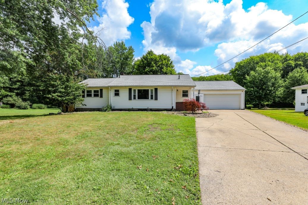 Welcome to 5854 Horning Road in Kent, Ohio-a charming ranch home offering the perfect blend of comfort, space, and
convenience. This well-maintained home features 3 bedrooms, 1.5 bathrooms, and 1,238 square feet of main-level
living space, plus an additional 854 square feet of finished walk-out basement, providing plenty of room to relax,
entertain, or work from home.
Step inside to a spacious living room with beautiful hardwood floors, while hardwood flooring also lies beneath the
carpet in all of the bedrooms, offering future possibilities for customization. The formal dining room creates the
perfect setting for family dinners and holiday gatherings.
The finished walk-out lower level expands your living space with a large recreation area, laundry room, and
convenient half bath. Outside, you'll love spending summer days enjoying the above-ground pool, relaxing on the deck
or patio, and taking advantage of the fully fenced backyard-all situated on a generous half-acre lot.
Additional highlights include a 2-car attached garage, storage shed, ample outdoor space, and a location that's hard to
beat. Just minutes from Downtown Kent, Kent State University, Downtown Ravenna, NEOMED, restaurants, shopping,
entertainment, and major roadways, this home offers easy access to everything you need while providing the comfort
of a peaceful setting.
Don't miss your opportunity to make this wonderful Kent home your own-schedule your private showing today!