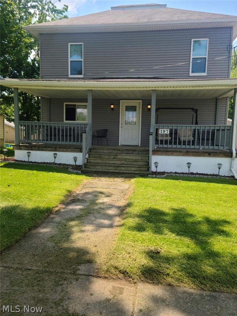Colonial Home built in 1880 and carefully remodeled throughout is available on 1.59 acres / Many trees in the back where garage and storage bldg. are located / Enjoy your coffee on enclosed porch overlooking spacious yard / Open floor plan on first floor with master bedroom / Bath on main floor / Friends will love to visit on covered front porch / Kitchen has been remodeled with wood cabinets and appliances are included / Three upstairs bedrooms or office space / Full bath on second floor needs completion / Great property minutes from Pymatuning Lake!