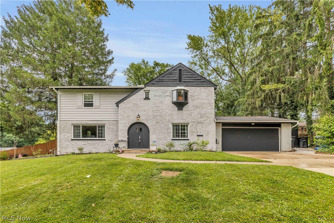 Welcome to 607 Castle Boulevard, where timeless architecture meets modern luxury in the
heart of West Akron. Completely renovated within the last two years, this stunning 4-bedroom, 2
full and 1 half bath home offers over 3,500 square feet of beautifully designed living space that
perfectly balances elegance, comfort, and functionality. Step inside to discover a bright, open
interior filled with natural light, highlighted by a breathtaking two-story family room featuring a
dramatic wall of windows overlooking the private backyard. A second-floor balcony creates an
impressive architectural focal point while offering views of the home's spectacular gathering
space below. The spacious office, surrounded by windows, provides an inspiring setting for
working from home or everyday productivity. Designed for both entertaining and daily living, the
home features an elegant formal dining room anchored by a charming gas fireplace,
beautifully renovated living spaces, and thoughtful updates throughout. The partially finished
basement offers additional flexible living space perfect for a recreation room, fitness area, media
room, or additional storage. Outside, enjoy your own private retreat with a fully fenced backyard
enclosed by a 6-foot privacy fence, creating the ideal space for relaxing, entertaining, children,
or pets. Additional highlights include a new roof, attached two-car garage, and a desirable
location close to parks, shopping, dining, and major commuter routes. Every detail has been
thoughtfully updated while preserving the character and warmth that make this home truly
special. Move-in ready and offering exceptional space, style, and natural light, 607 Castle
Boulevard is ready to welcome you home.