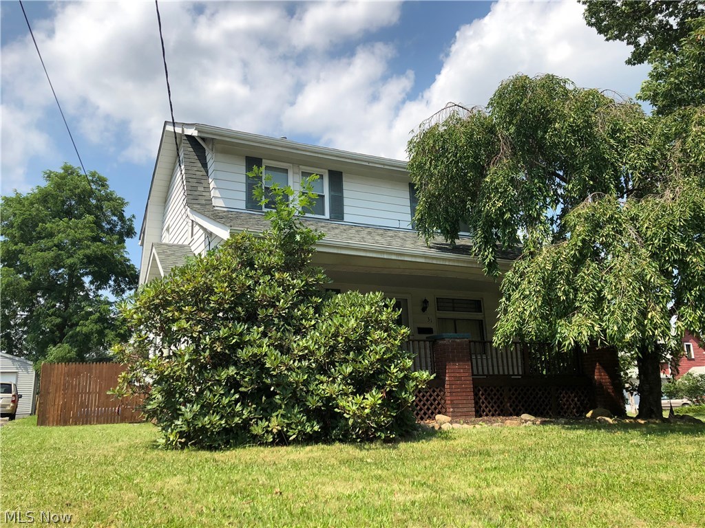 Well maintained 3 bedroom, 2 bath two story home with over 1300 square feet of living space. Natural wood trim on the main floor, the living room has a brick fireplace with built in bookcases. Dining room has a beautiful bay window with a window seat. Large front porch great for cool summer nights. Tons of storage and closet space. Partial privacy fence. Roof, wiring, most windows were replaced in 2014.