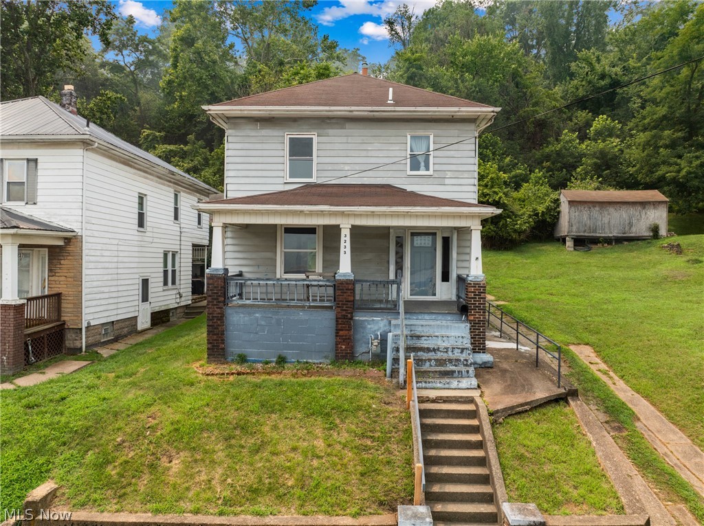 Welcome to 3233 Elm Street in Weirton, WV—a move-in-ready home offering plenty of space for everyone and priced to sell! Relax on the inviting covered front porch before stepping inside to discover timeless character, three generously sized bedrooms, high ceilings, beautiful natural woodwork, charming pocket doors, and abundant natural light. Nearly all the windows have been replaced, roof and furnace are approximately 20 years old. Outside, you’ll appreciate the convenience of off-street parking and a storage shed for tools, lawn equipment or bikes. Whether you’re searching for a place to call home or a smart addition to your investment portfolio, this property is full of potential. Conveniently located near schools, shopping, dining, and everyday amenities—and only 25 minutes from Pittsburgh International Airport! Schedule your private showing today.