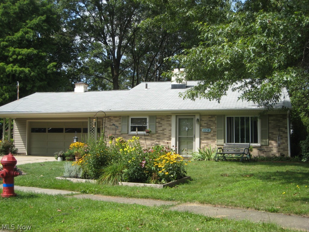 If you are looking for Great Condition - here it is!  The seller has meticulously updated this 3BR 1.5 Bath Multi Level home.  Walk into spacious living room that opens to the appliances kitchen w/eating area.  The 3 bedrooms feature beautiful hardwood floors and new floor to ceiling wood closet doors.  The bath is newly remodeled w/vanity, sink, faucets, flooring and shower.  Drop ceilings in the living room and kitchen can be removed to open up to original cathedral ceilings.  The lower level family room (19x19) is perfect for entertaining and relaxation.  Room for a pool table, wall mounted flat screen, exercise equipment or office area.  A new half bath too! 2 1/2 car garage.  Perennial gardens surround the exterior.  List of improvements:  Exterior doors & shutters 2013, siding & windows 2005, glass block window 2005, Ohio State Waterproofing w/transferable warranty 2008, sump pump w/battery back up 2008, Breathe Rite Ventilation System 2008, family room and Allure (Laminate) floo