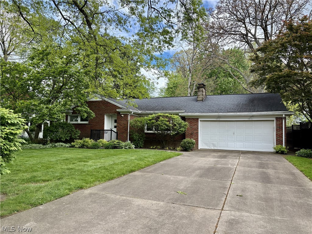 Welcome to this beautiful mid-century all brick home in North Canton Schools! 3 BR, 2 BA, large living room with gas log fireplace, dining room with built in china cupboard, den/office with built in bookcases, updated kitchen with lots of storage and main floor bath. The entire main floor has been freshly painted including ceilings and new neutral carpet throughout the house.This home has all the charm of a mid century home with pocket doors and built ins. The basement doubles the living space but does need some work - but has been waterproofed. The heat is baseboard radiant heat and has a newer unit that is very efficient - there is no a/c but window units or splitters work perfectly to cool the house effectively.