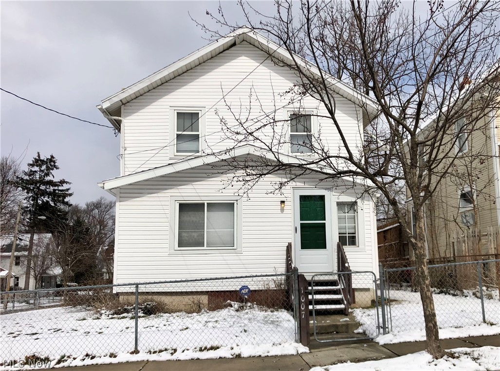 Investors or First Time Homebuyers this home was meant for you!  Very well maintained, turn key property just minutes to the expressway. The living room is oversized and has an abundance of light. The dining room has a large window seat and opens up to a spacious kitchen with plenty of countertop space. There's a mud room off the kitchen which leads a nice deck. The front porch is completely enclosed and is perfect as a 3 season sun room. Upstairs you'll find three moderate sized bedrooms and an ample sized bathroom. The mechanics appear to be updated and in working order.  The options are endless in this home with all the extra space. The yard is fenced and the driveway appears to be private. This home is sold "as is" by a Trustee so all info shall be verified by buyer(s).  Could be sold as a package deal along with 2392 29th St SW, Akron.