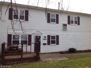 Why rent when you can own this nicely updated spacious 3 bedroom town-home with attached garage and deck overlooking common area? It feels like you have your own private yard! Updated kitchen with ample counter and cabinet space, pantry & ceramic tile floor that open to the dining/living room with newer carpet and custom blinds. The full bath is nicely redone with pedestal sink, ceramic tile floor and tile tub surround. Newer carpet in most of the upstairs. The master bedrooms has 2 closets - one of which is a walk-in and a ceiling fan. Large 2nd bedroom also has a walk-in closet. Nice sized 3rd bedroom or office with laminate floor and ceiling fan. Where else could you find an updated, affordable, maintenance free townhouse that is move-in ready and close to everything. Don't miss this wonderful opportunity