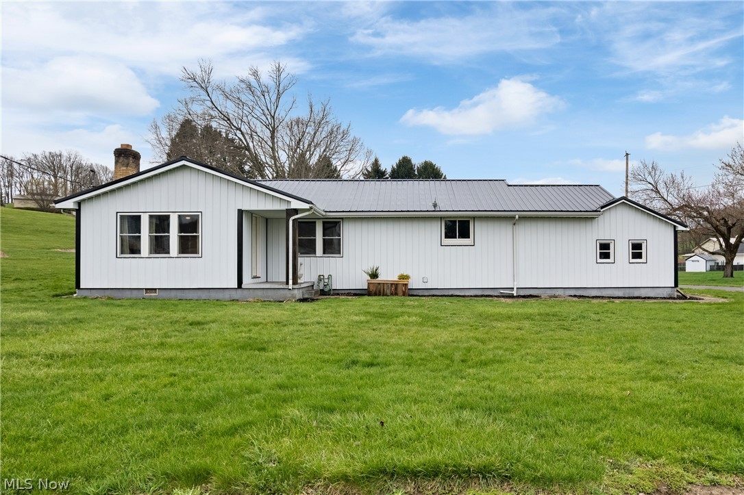 Welcome home to this move-in-ready ranch on 2 acres! Nothing to do but unpack and start enjoying all this house has to offer. This 3-bedroom, 1-bathroom house features many upgrades and extras! Starting outside, you have brand new metal siding (2026) and roof (2025), chicken coop and run, swingset, greenhouse, and detached 20x50 2-car garage for extra storage. You will also find a large gravel drive for extra parking, a fire pit, and a covered back porch to enjoy those beautiful days. Inside, the main level features an updated kitchen with new appliances (2024) that flows into the large dining room and comfortable living room. You will also find 3 bedrooms and 1 full bathroom. Updates include can lighting throughout, new windows (5 of the 7), new water softener (2025), new exterior doors (including sliding door to back deck), and new HVAC system (2024). This home is truly ready for you to move right in! Don't miss your chance to see this beauty!