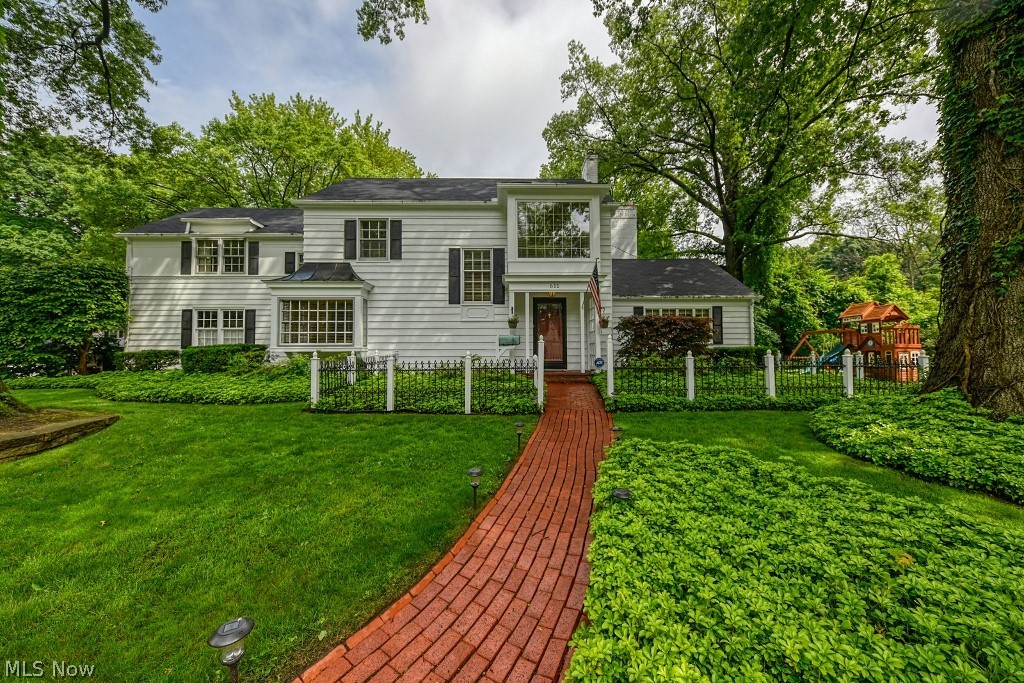 A beautiful, historic Colonial home, nestled in a quiet neighborhood at the end of the street. Enough space for everyone with five bedrooms, three bathrooms, 3 fireplaces (1 of which is a wood burner). Newer carpet throughout the upstairs with hardwood flooring in the main level. The great room boasts vaulted ceilings and a wall of windows letting in sunshine while also offering a great view of the side yard.
The wood paneled family room could be a great place to read and relax with a roaring fire or the space could be used in many different ways. The two car attached garage, well landscaped yard and mature shade trees round out the perfect setting. Ample storage space throughout the home will help keep things organized. The property is within walking distance to King Elementary. A completed home inspection report and appraisal are available to any accepted offers. This will save the buyer time and money. The HVAC systems have been serviced month of July. HVAC system has zones which a