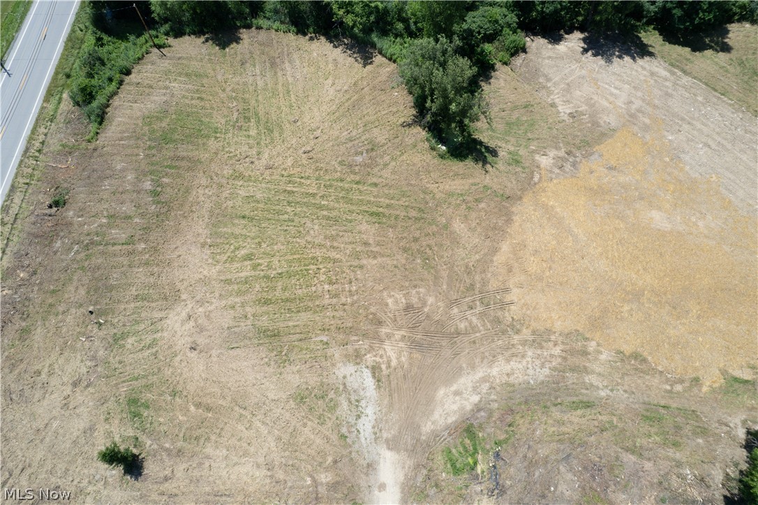 Great opportunity to own 1.83 acres in Springfield Township! This corner lot is situated on S Cleveland Ave at Samuel Rd and offers a generous open setting with convenient road frontage and driveway access already in place. The aerial views show a mostly cleared parcel with a natural tree-lined backdrop, offering room to explore future possibilities. The parcel also has electricity run to the lot and an address already established.

Located in the Springfield LSD, this property is on a route expected to receive city water and sewer service in the future. The rear of the property is surrounded by wetlands, so buyers should verify all building requirements, setbacks, utilities, soil/septic options, zoning, permits, and intended use with the appropriate township and county authorities. Bring your vision and explore the potential this spacious lot has to offer!