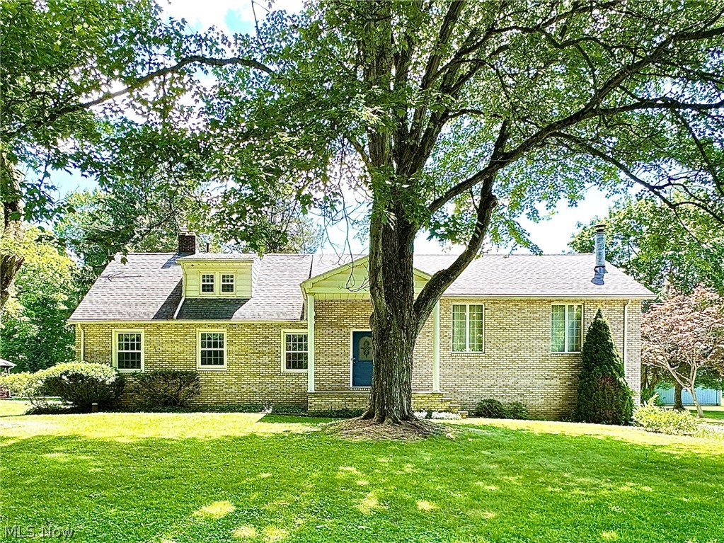 Welcome to 1465 Warner Road in Hubbard, Ohio—an exceptional opportunity to own a spacious home situated on 3.5 acres of level, usable land within the Brookfield Local School District. This well-maintained residence features 4 generously sized bedrooms plus a dedicated office that could easily serve as a 5th bedroom, offering flexibility for growing families, remote work, or guest accommodations. The home boasts beautiful hardwood flooring throughout the original portion of the home, adding warmth and timeless character. Designed for both comfortable living and entertaining, the property offers two fireplaces, creating inviting gathering spaces in both the living room and the enormous 16' x 34' family room. The expansive family room provides ample space for hosting family and friends, recreational activities, or simply relaxing at home. Car enthusiasts, hobbyists, and outdoor recreation lovers will appreciate the exceptional garage and storage capacity. The property features a 26' x 34' attached three-car garage as well as a massive 24' x 40' detached garage, providing parking for approximately seven vehicles. These versatile spaces are ideal for classic cars, ATVs, side-by-sides, boats, recreational equipment, workshops, or additional storage. Enjoy the privacy and possibilities that come with 3.5 flat acres while still maintaining convenient access to local amenities, schools, and major roadways. Whether you're seeking room to grow, space for your hobbies, or a property with outstanding garage facilities, this unique offering checks all the boxes.