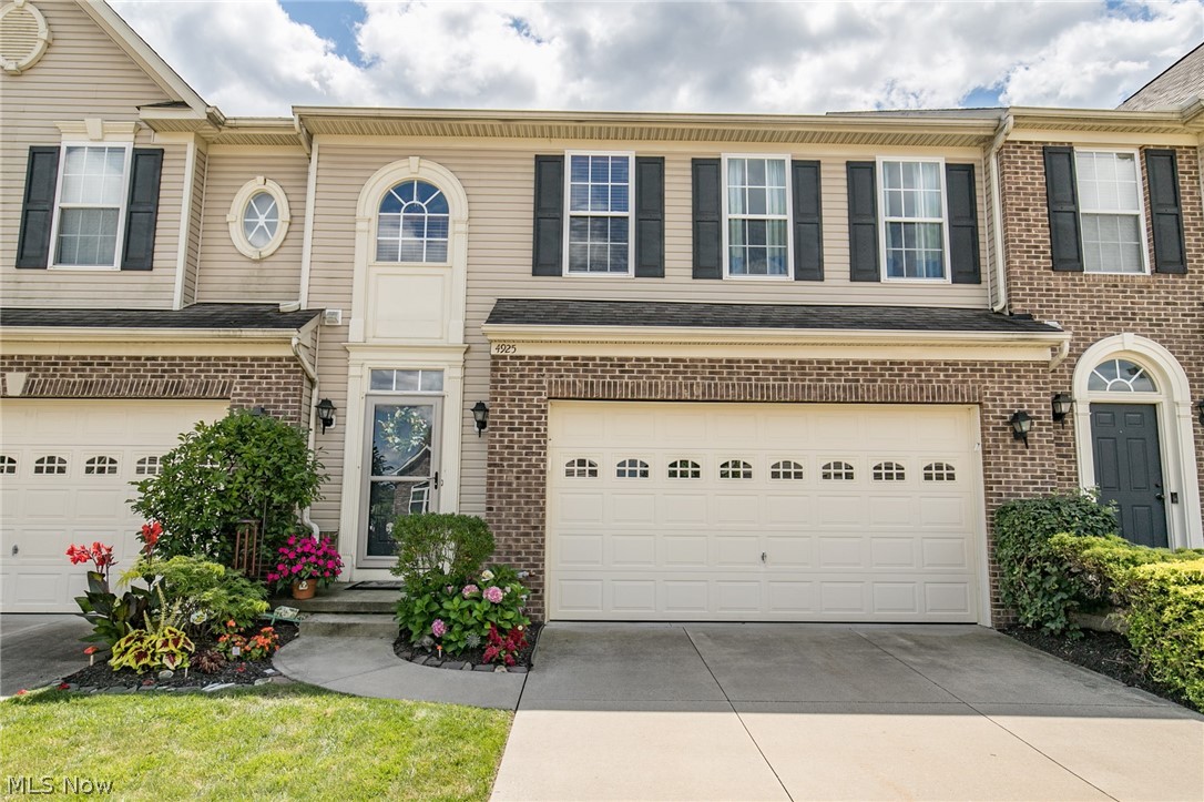 Welcome Home!! Stunning Townhome In Desirable Hudson Schools. Inviting Foyer Entry To Great Room With Fireplace, Open To Formal Dining Room. Kitchen With Breakfast Bar, Granite Counters and All Appliances To Stay. Upstairs 3 Generous Sized Bedrooms, Master With Walk-In Closet and Full Bath. Guest Bath and Loft. Full Basement Partially Finished With Plenty Of Storage and Workshop. Two Car Attached Garage. Convenient Second Floor Laundry With Washer and Dryer To Stay. Modern Color Palette and Custom Window Treatments Throughout. Private Back Yard With Patio. Step Into Park System Right From This Home. Low Monthly Maintenance Fee $100, Newer Hot Water Heater. Security System. Close To Freeway, Turnpike, Shopping, Hike and Bike Trails, Enjoy Summit County Tax Base and Gorgeous Surroundings.