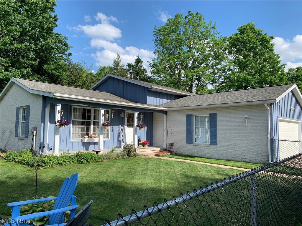 Look no further for that perfect Dover home! Spacious 4 bedroom/2 bath on just under half an acre lot tucked away back off the road for privacy. Walk in to the updated living room that is open to dining area with sliding doors to outside deck. Large kitchen with plenty of cabinets and newer appliances. Newer flooring and paint throughout most of the home. Lower level with family room, full bath and bedroom with walk-out to sunken outside living area. Master bedroom offers built-in dresser and double closets. Fenced-in yard for your pets and fire ring to enjoy those chilly evenings. Oversized Zoar attached garage with new door. Roof 2015. One-year home warranty included. Call today for your private tour of this great home.