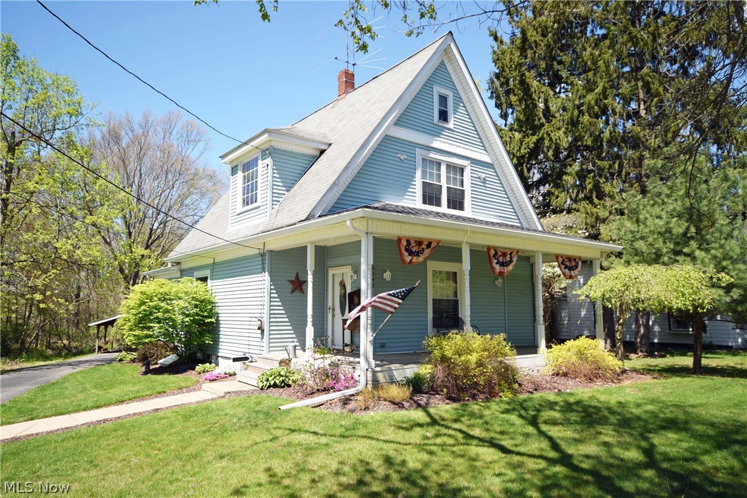 Old world charm with all the upgrades! Great curb appeal with an awesome wrap around front porch. First floor master bedroom, updated bathroom including tile flooring and granite countertop, first floor laundry, remodeled kitchen, spacious dining room. Oversized 2 car garage with an additional carport. Updates include: new septic system (2015), new water heater,  sump pump, front and back roof with new 6" gutters and downspouts (2015), new electrical panel (2010), 1st floor bathroom (2015). You won't find another one like this! Call today to schedule your personal showing!