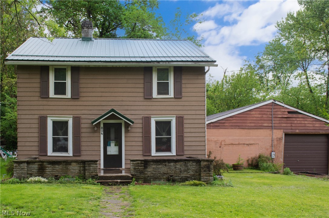 Welcome to 804 Hollywood! Nestled on a private dead-end street, this spacious 4-bedroom, 1.5-bath home offers privacy, updates, first-floor laundry, and endless potential! Recent improvements include a brand-new septic system completed this month, a newer metal roof- 2022, updated kitchen backsplash, and a beautifully renovated full bathroom completed in January 2026.

Outside, you'll find an oversized detached garage that is truly a handyman's dream- offering ample space for vehicles, storage, a workshop, hobbies, or future possibilities. With room to fit many cars, the opportunities are endless! 

If you have been searching for a home with character, updates already completed, and space to make your own, this one is a must-see! Call today to schedule your showing!